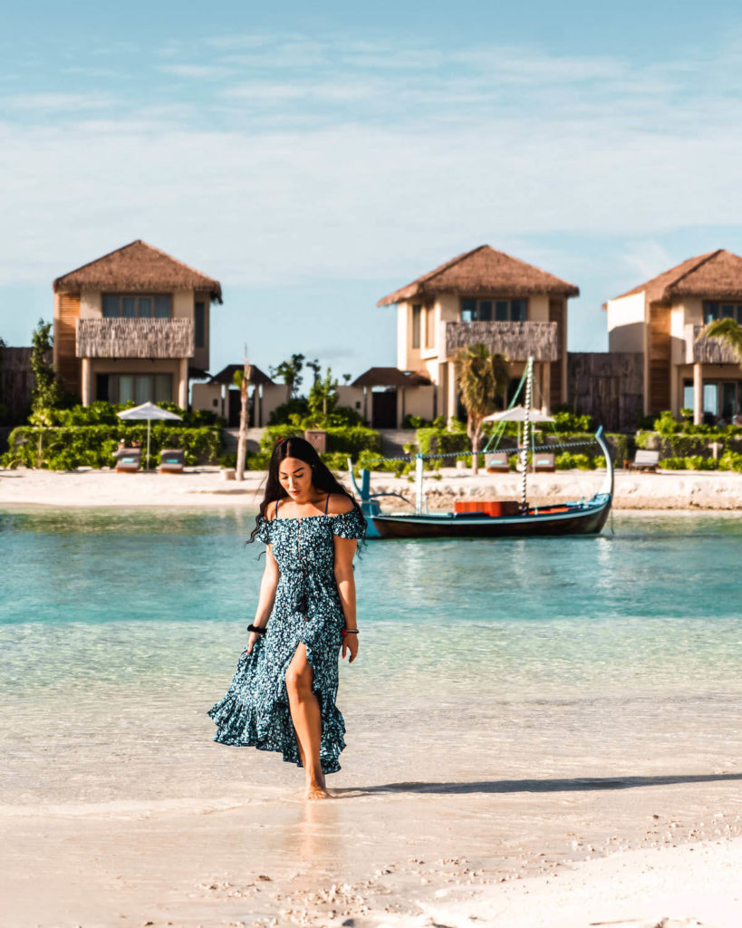 Isabella-wearing-blue-dress-on-the-beach at Intercontinental Maldives