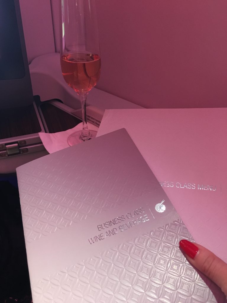looking at the beverage and dining menus in Qatar Business Class on board service