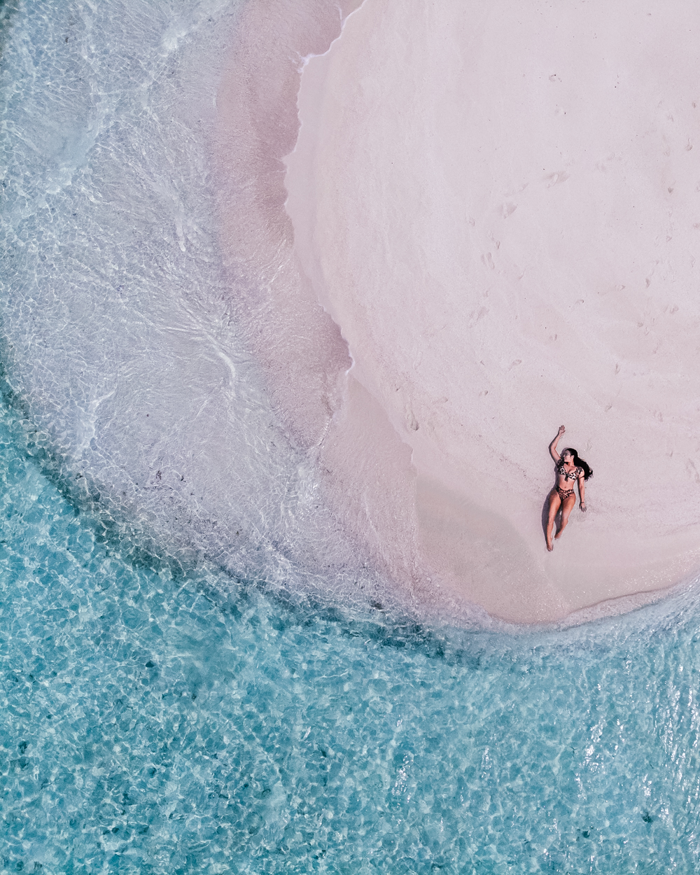 Isabella on a sandbank in The Maldives