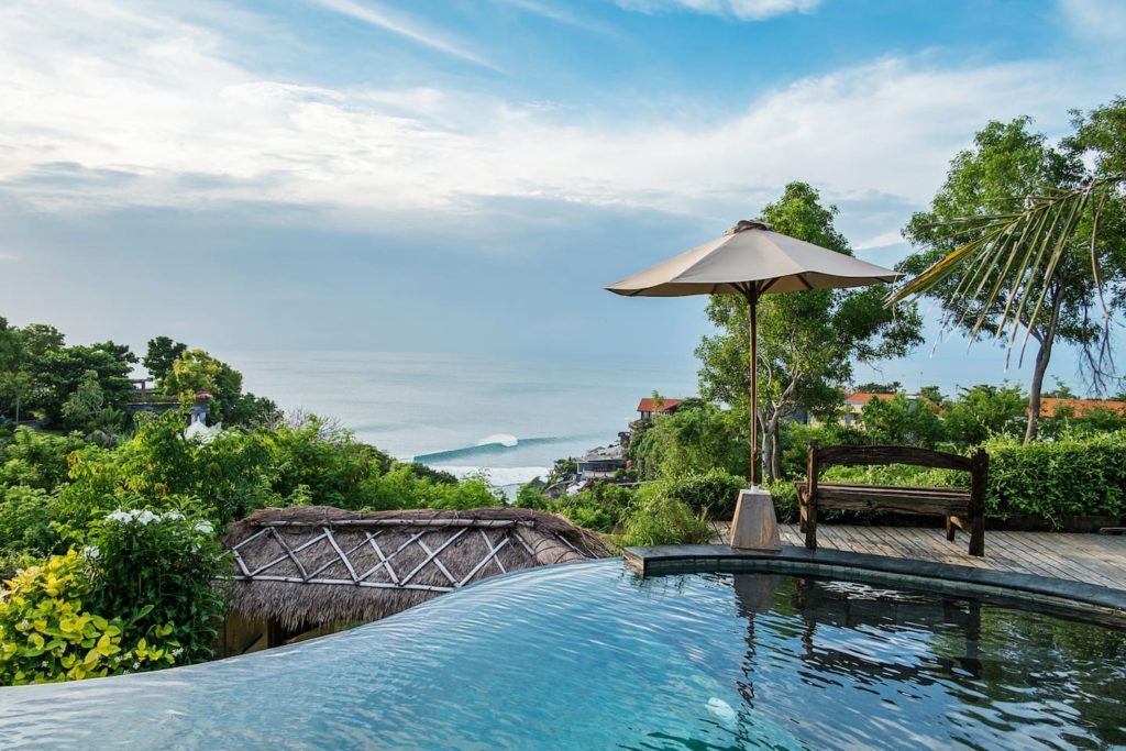 Infinity pool overlooking the ocean  from a luxury Airbnb in Uluwatu, Bali