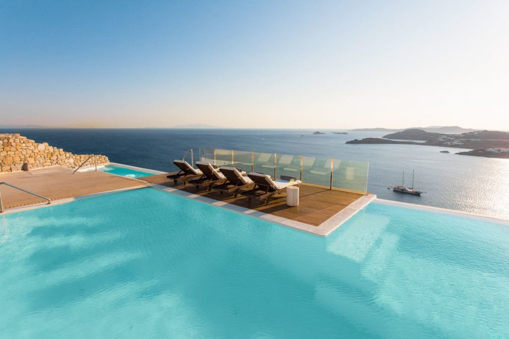 Day beds and infinity pool at Horatia, a luxury Airbnb in Mykonos