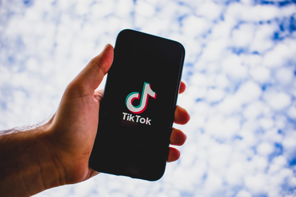 Phone screen displaying TikTok logo 