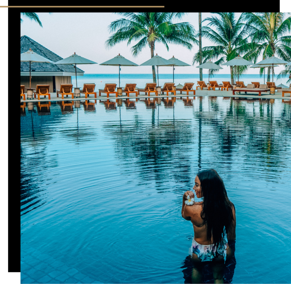 Isabella in the pool at the Surin luxury resort on Phuket island, Thailand