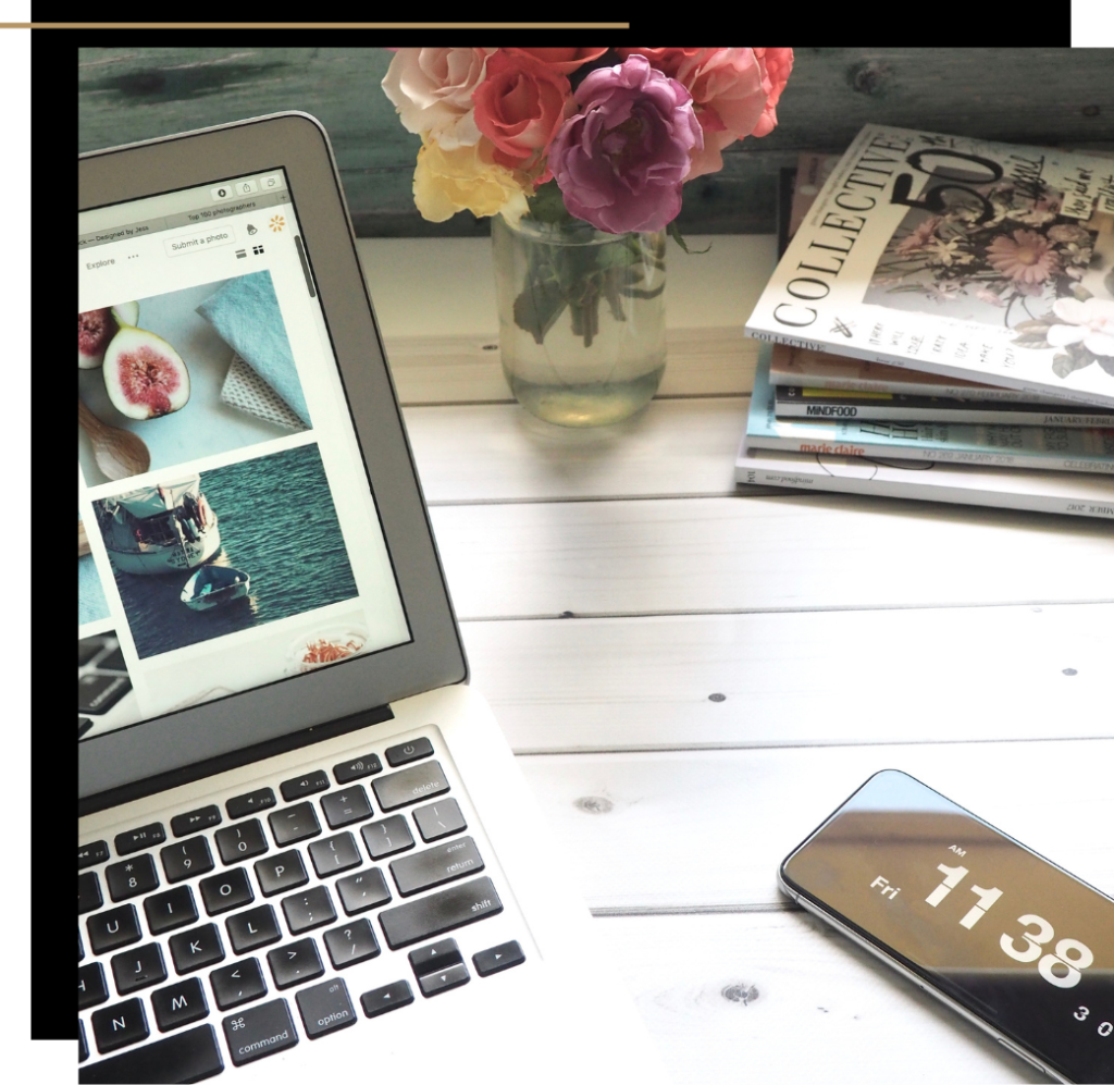 Laptop, phone, magazines and roses