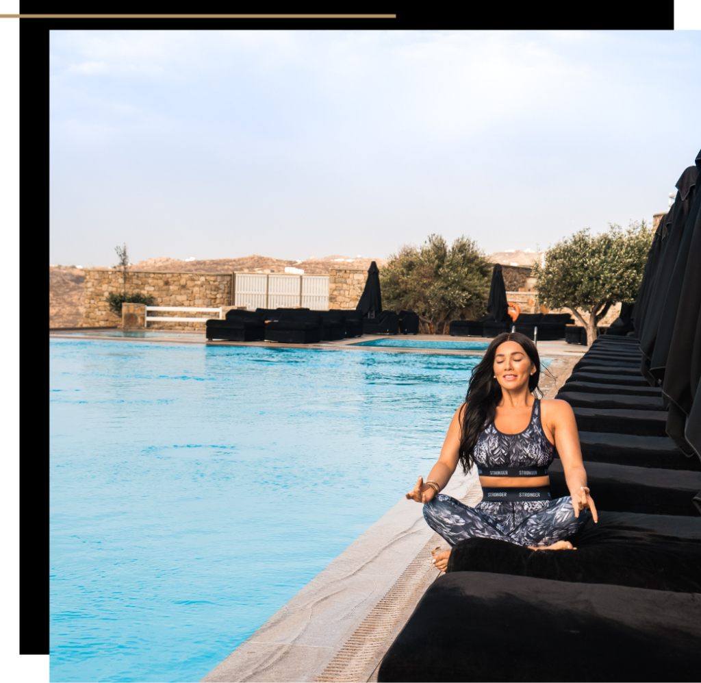Isabella meditating during a luxury wellness retreat at home 