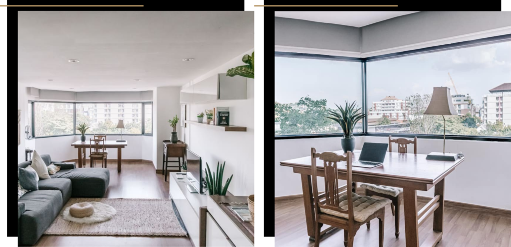 A living room and desk space in an Airbnb in Chiang Mai