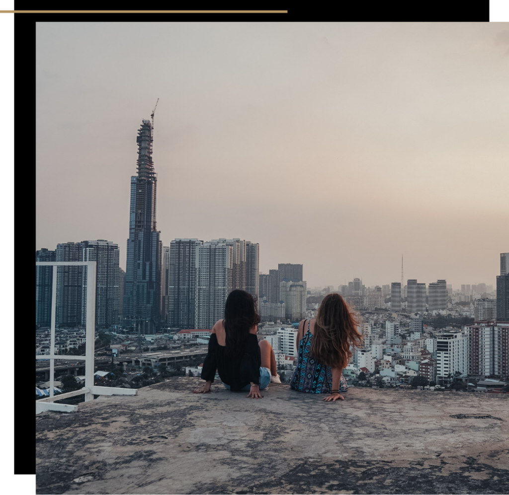 Two girls on a rooftop in Ho Chi Minh City, Vietnam one of The Best Cities in Asia for Digital Nomads