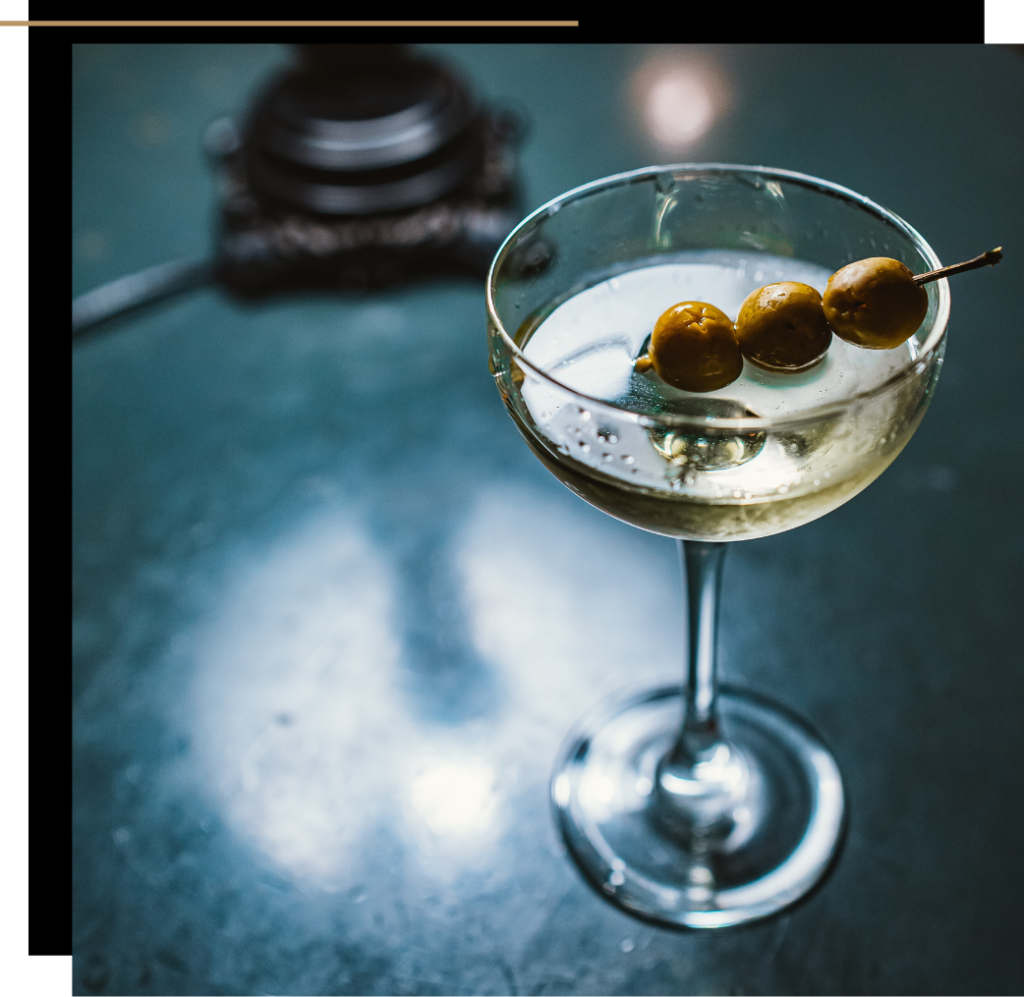 A martini with olives 