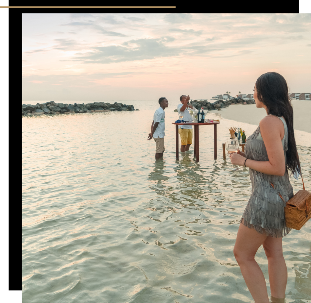 Isabella at a wine tasting in the sea at Emerald Maldives Resort & Spa