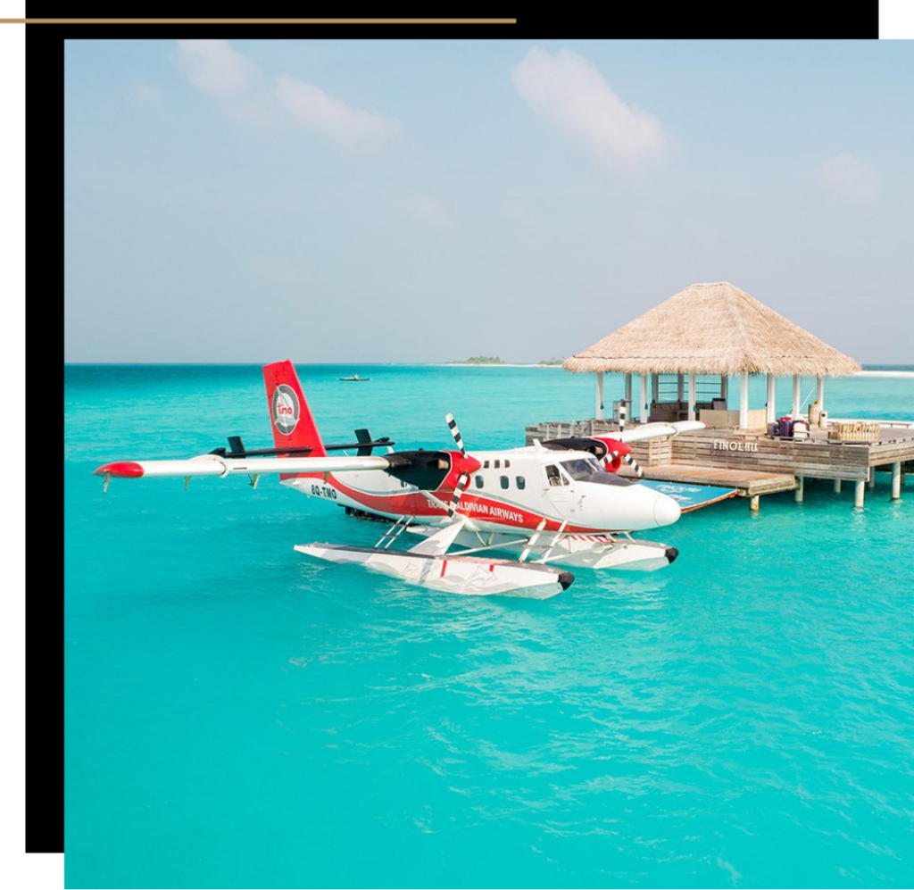 Seaplane collecting passengers at a luxury Maldives resort